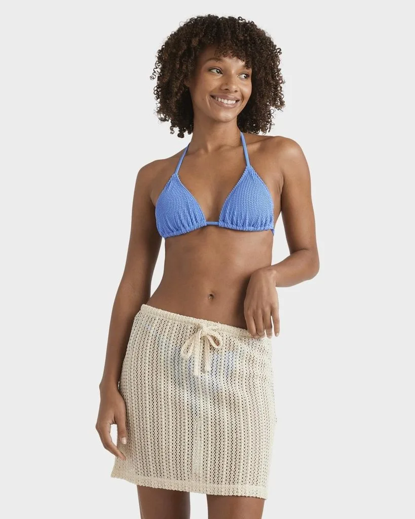 Blue Bikini With a White Crochet Skirt
